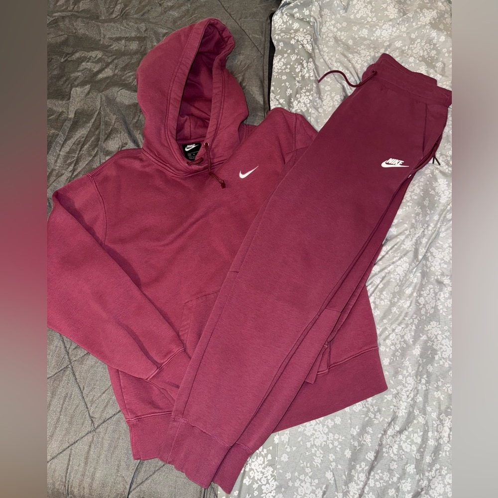 Magenta colored Nike sweatsuit